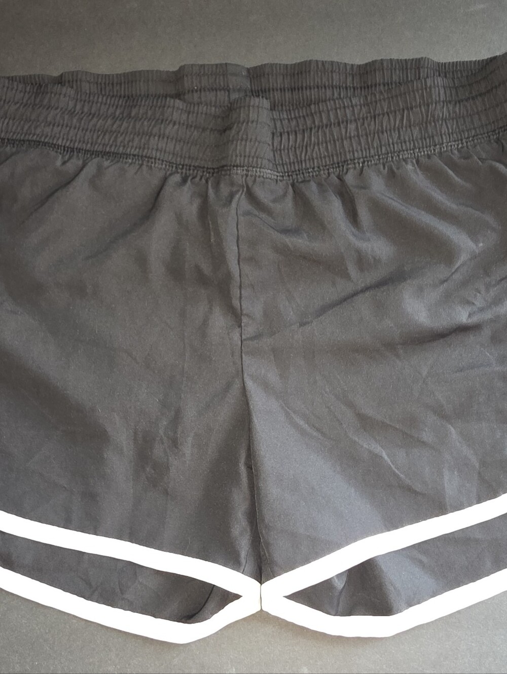 Champion Black Athletic Shorts with White Trim Accents
